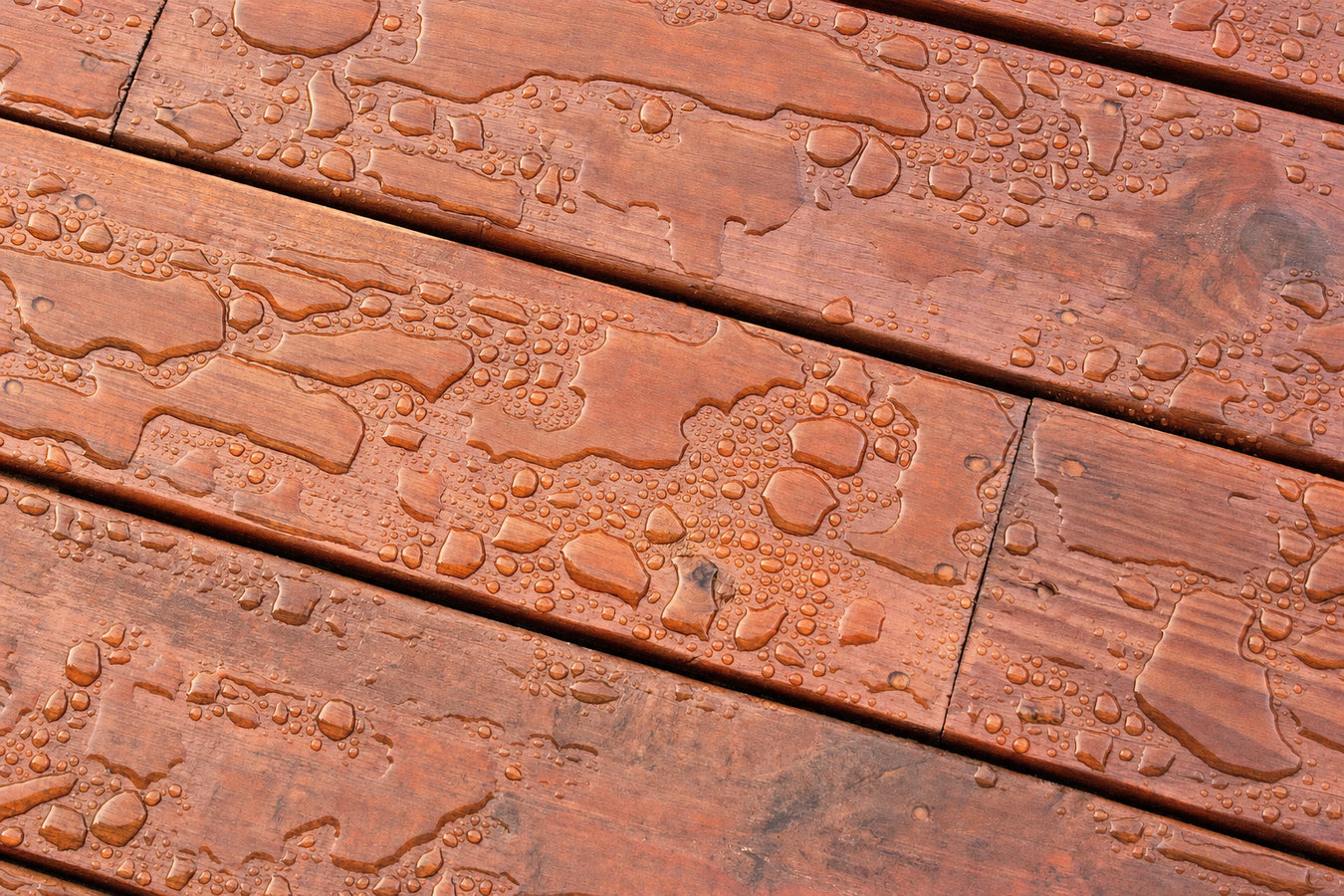 Deck staining and sealing
